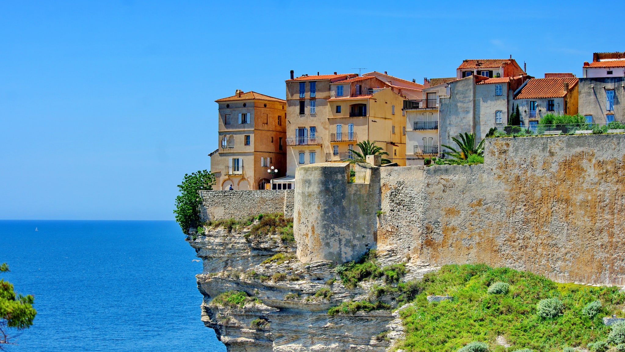 Houses on top of cliff